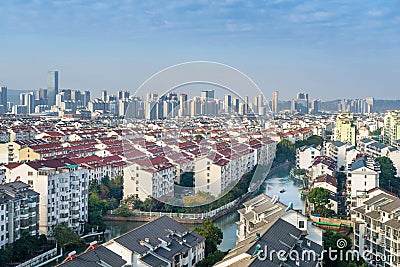 Cityscape of residential house rooftop and skyscraper Stock Photo
