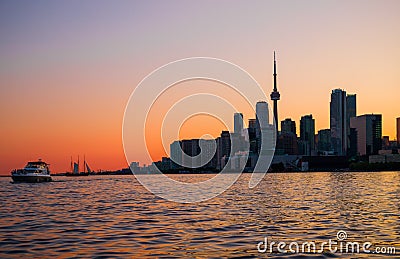 Cityscape - silhouettes of skyscrapers, calm lake old sail ship and yacht. Stock Photo