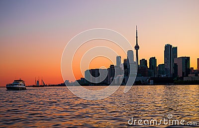 Cityscape - silhouettes of skyscrapers, calm lake old sail ship and yacht. Stock Photo