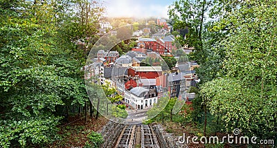 Cityscape of Spa in Belgium. View from up hill with cable car rail. Stock Photo