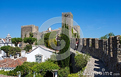 Cityscape of the town of Obidos in Portugal with medieval houses. Editorial Stock Photo