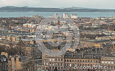 Cityscape view of Edinburgh towards Leith Docks and the Firth of Forth from Calton Hill Stock Photo