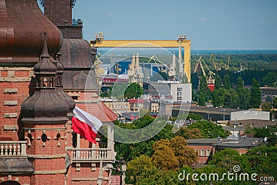 Cityscape with yellow cranes in the background Editorial Stock Photo