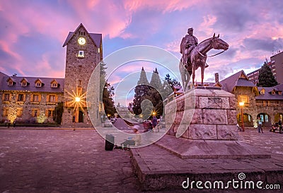 Civic Centre and Roca Statue at main square in downtown Bariloche City at sunset - San Carlos de Bariloche, Argentina Editorial Stock Photo