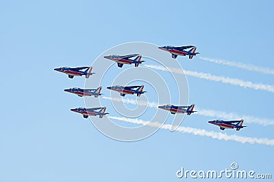 Civil airplanes making aerobatic manoeuvres Editorial Stock Photo