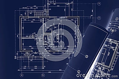 Civil building sketch drawings, rolled blueprints on dark blue s Stock Photo
