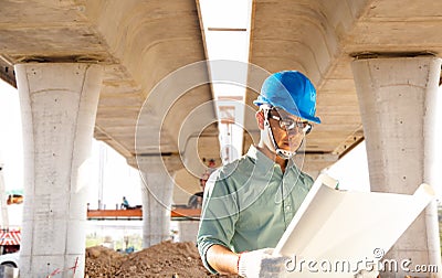 Civil engineers are checking the construction of the expressway Stock Photo