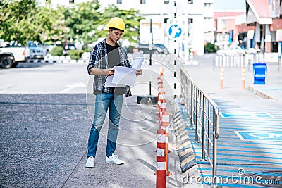 Civil engineers perform road conditions Stock Photo