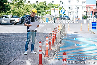 Civil engineers perform road conditions Stock Photo
