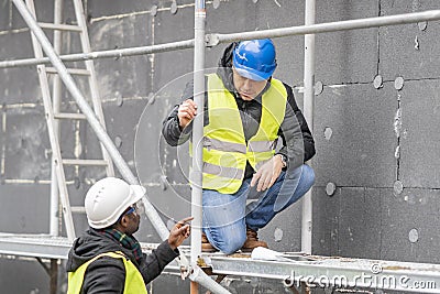 Civil engineers working on construction site Stock Photo