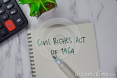 Civil Rights Act of 1964 write on a book isolated on Wooden Table Stock Photo