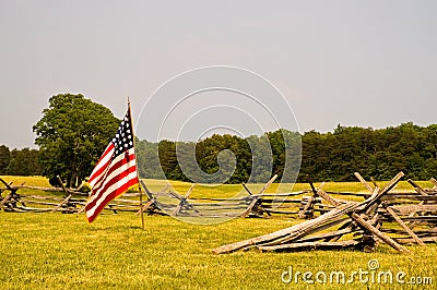 Civil War battlefield and flag Stock Photo