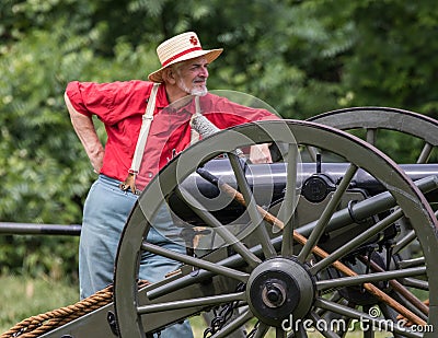 Civil War Soldier and his Cannon Editorial Stock Photo