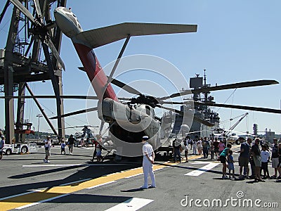 Civilians inspect an CH-53E Sea Stallion Editorial Stock Photo