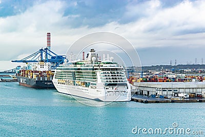 Royal Caribbean Cruise Line Jewel of The Seas Cruise Ship and MSC Maureen Cargo Ship docked in the Port of Civitavecchia, Rome. Editorial Stock Photo