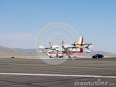 CL-415s Water scooping firefighting Aircraft on the tarmac of the Reno-Stead Airport Editorial Stock Photo