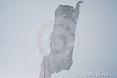 Clacked cement of white wall. Stock Photo