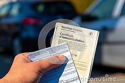 Administrative documents for French vehicles. Registration certificate, also called `Carte grise` and international insurance card Stock Photo