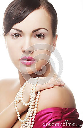Clamor woman with pearl Stock Photo