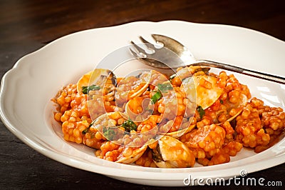 Clams and Fregola Stock Photo