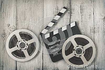 Clapperboards and two reels of film Stock Photo