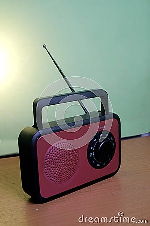 Clasic FM radio in red and black with adjusting frequency Stock Photo
