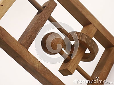 A clasic wooden puzzle on a white background Stock Photo