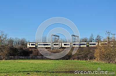 Class 387 EMU Passes Walsworth Common, Hitchin Editorial Stock Photo