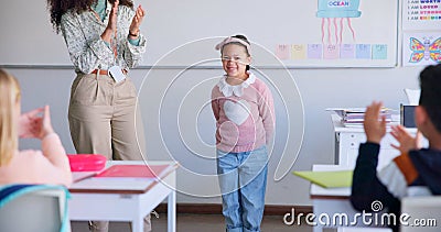 Class, presentation success and child speaker with applause and cheering in classroom at school. Young kid, education Stock Photo