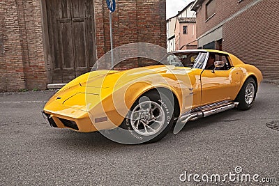 Classic American sports car Cheevrolet Corvette C3 Stingray of the seventies with side pipes exhaust in 24th Meeting auto vintage Editorial Stock Photo