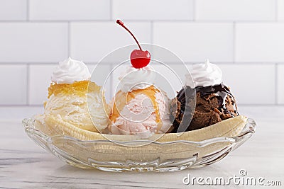 A Classic Banana Split on a Kitchen Cabinet Stock Photo