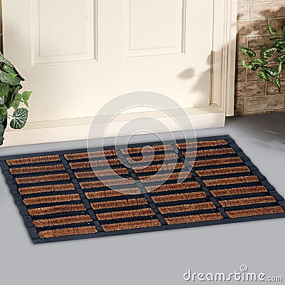 Classic beige zute and black rubber mix Outdoor Doormat Stock Photo