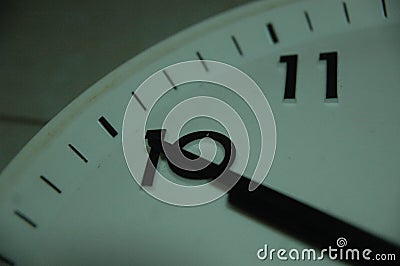 Classic black wall circular clock with round points Stock Photo