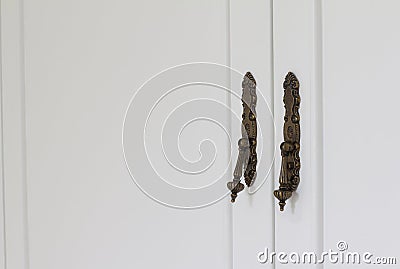 Classic brass handle of cabinet Stock Photo