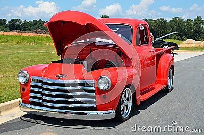 Classic car with open hood Stock Photo