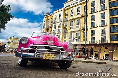 Classic Chevrolet in front of a hotel in Havana Editorial Stock Photo