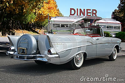 1957 Chevrolet Bel Air convertable parked at vintage diner. Editorial Stock Photo