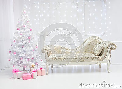 Classic Christmas light interior in white and pink tones with a couch Stock Photo