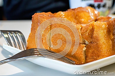 Classic dessert in Hong Kong tea restaurant, deep-fried western toast with condensed milk and peanut sauce Stock Photo