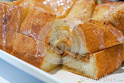 Classic dessert in Hong Kong tea restaurant, deep-fried western toast with condensed milk and peanut sauce Stock Photo