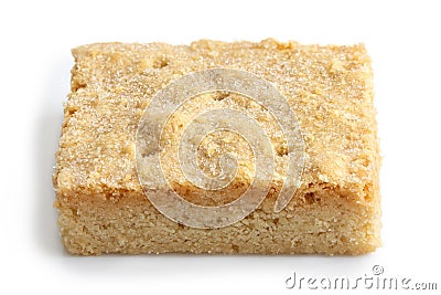 Classic homemade square shortbread biscuit isolated on white. Stock Photo