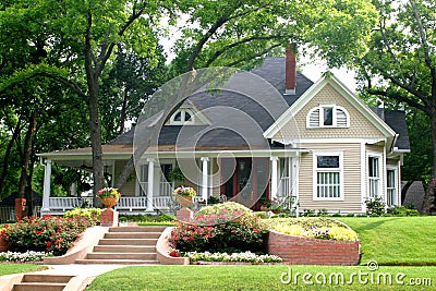 Classic House with flower garden Stock Photo