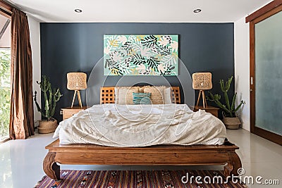 Classic interior bedroom at cozy house with ethnic decor Stock Photo