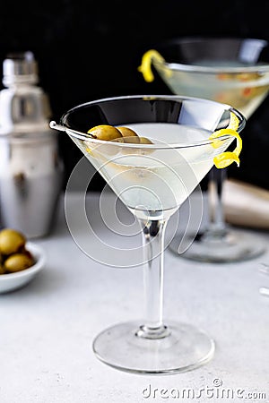 Classic lemon drop martini with olives and lemon Stock Photo