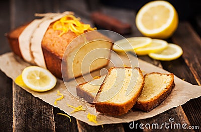 Classic lemon pound cake on rustic wooden background Stock Photo