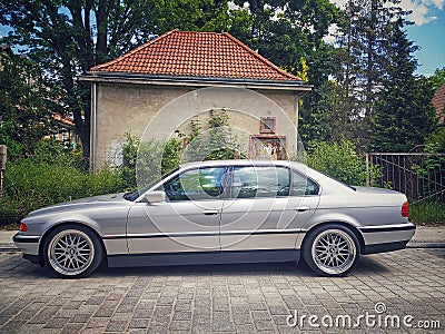 Classic old sedan luxury expensive car BMW 750 V12 left side view parked Editorial Stock Photo