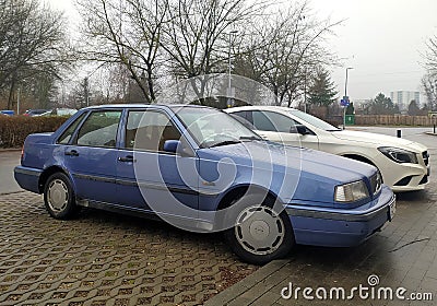 Classic old veteran vintage scrap rusty sedan car blue Volvo 460 parked Editorial Stock Photo