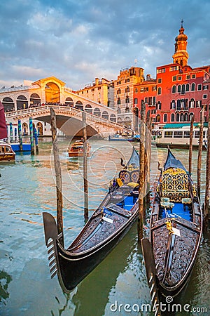 Canal Grande with Gondolas and Rialto Bridge at sunset, Venice, Italy Editorial Stock Photo