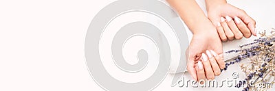 Classic pink wedding nail manicure on white backdrop. Spa treatment concept Stock Photo