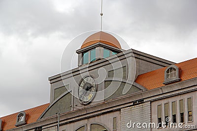 Classic pointer clock in church tower Stock Photo